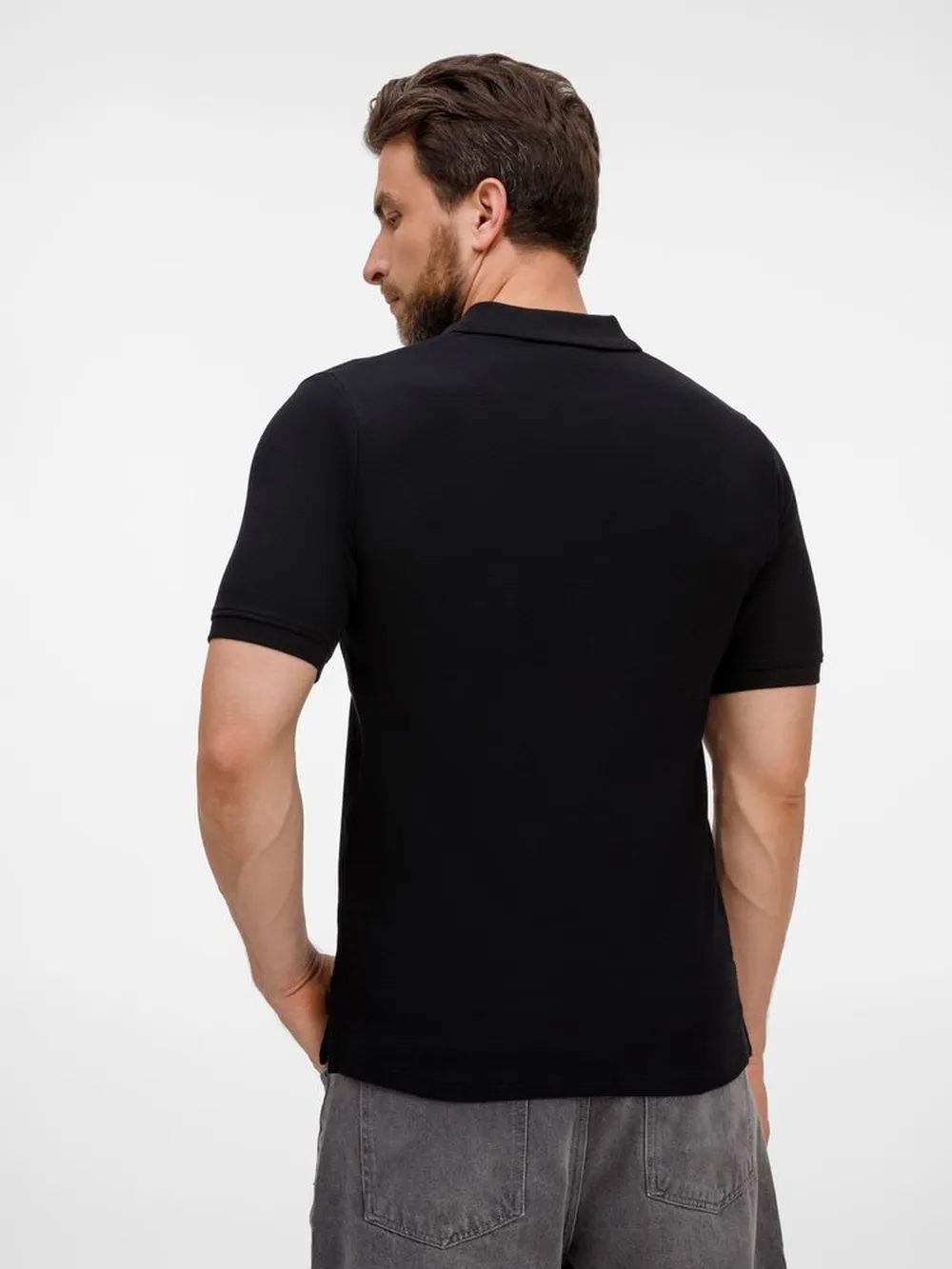 Рубашка поло унисекс Upswing, черная заказать онлайн с вашим дизайном на заказ в Москве и области