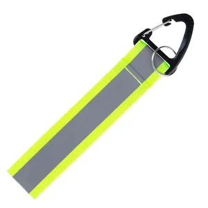 Светоотражающий брелок Flashline, серый с зеленым заказать онлайн со своим дизайном в РПК КБ с доставкой и скидками